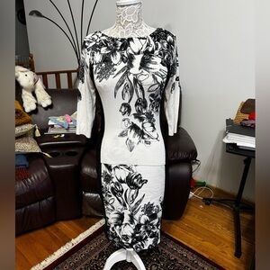 WHBM pencil skirt, fully lined, zipper, hook closure and back slit. Size 4.